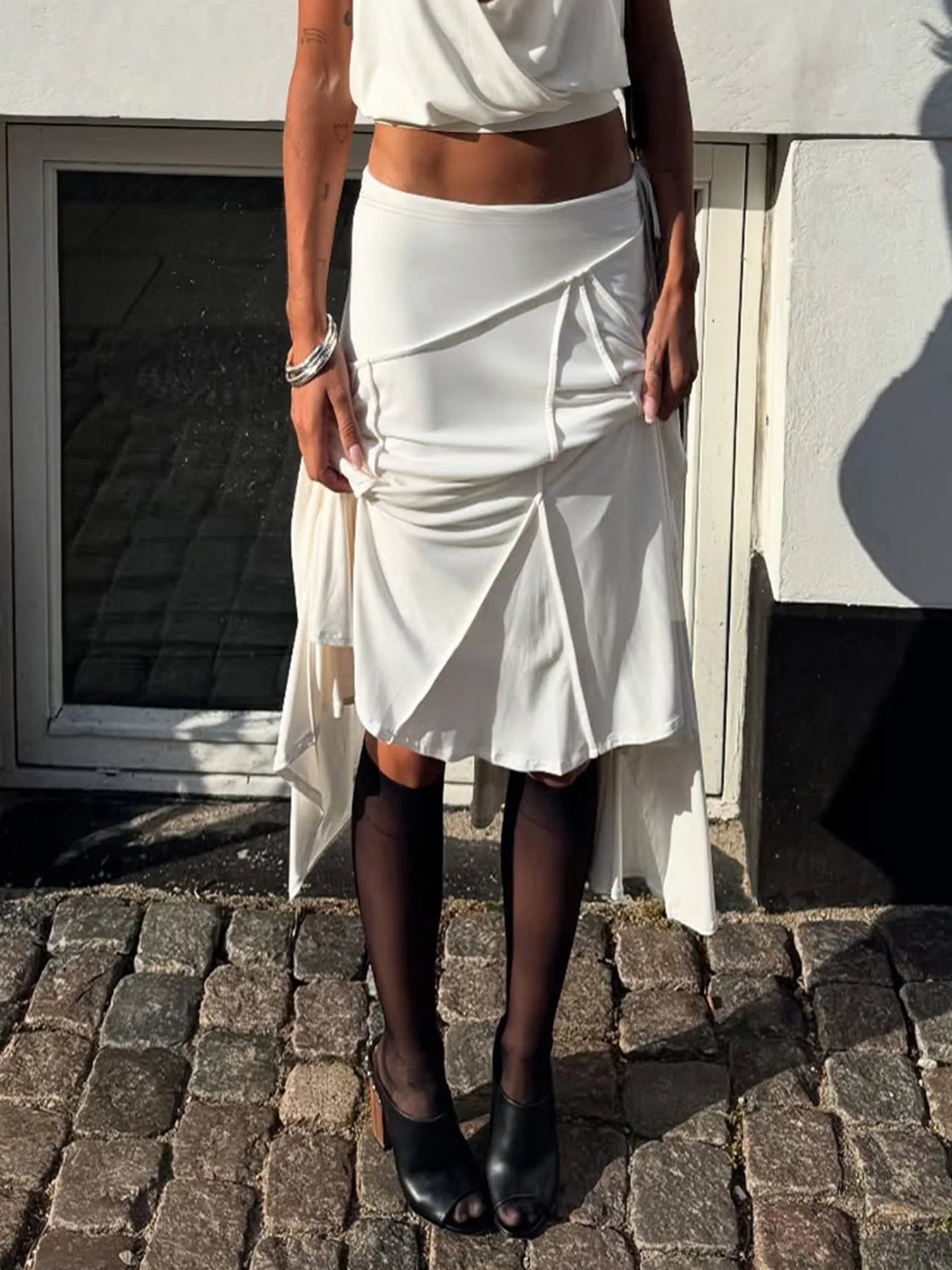 Vacation style temperament irregular European and American fashion spicy girl mid length skirt
