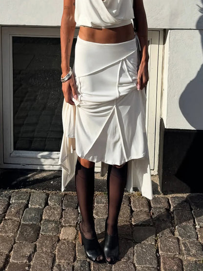 Vacation style temperament irregular European and American fashion spicy girl mid length skirt