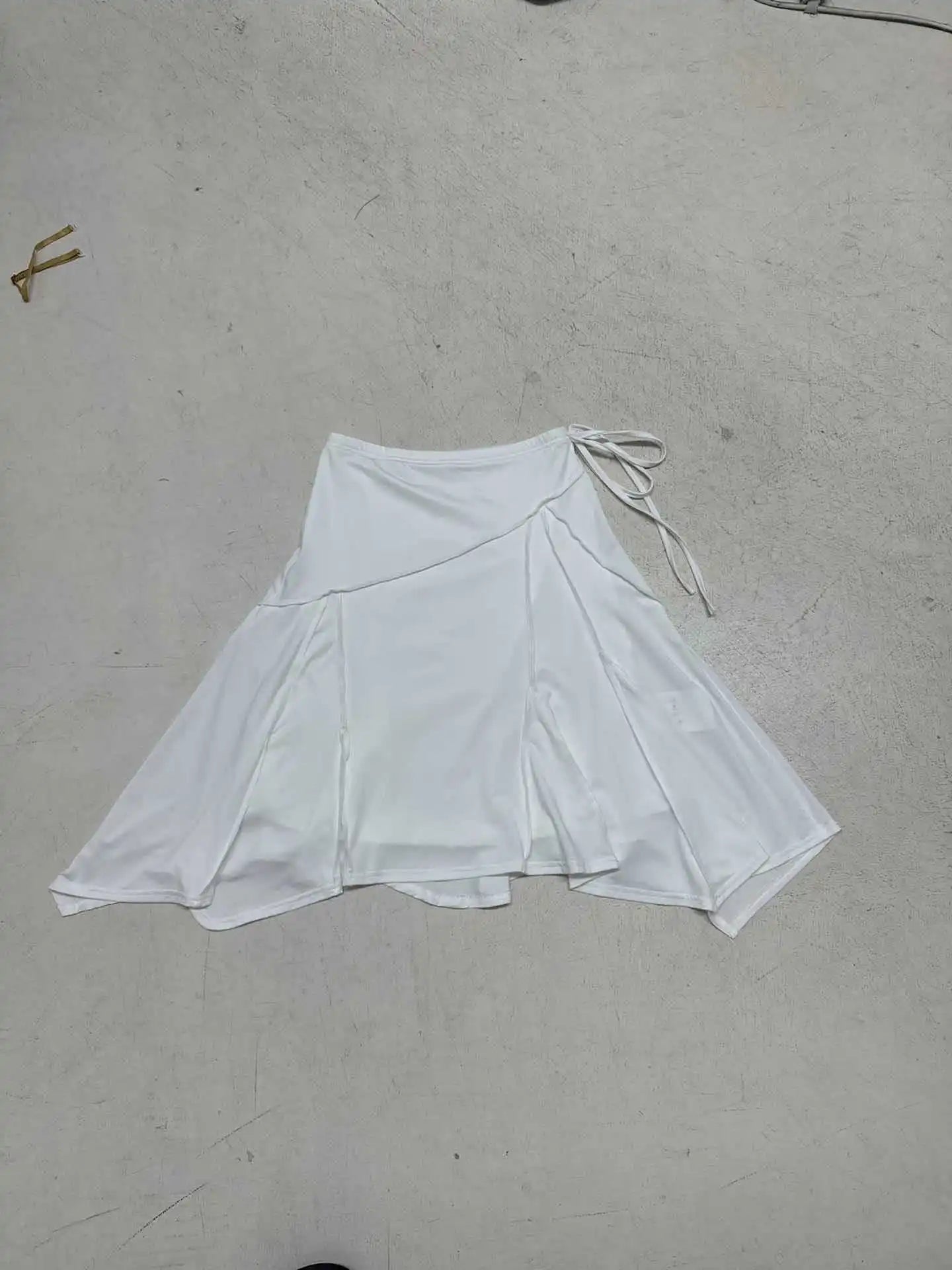 Vacation style temperament irregular European and American fashion spicy girl mid length skirt