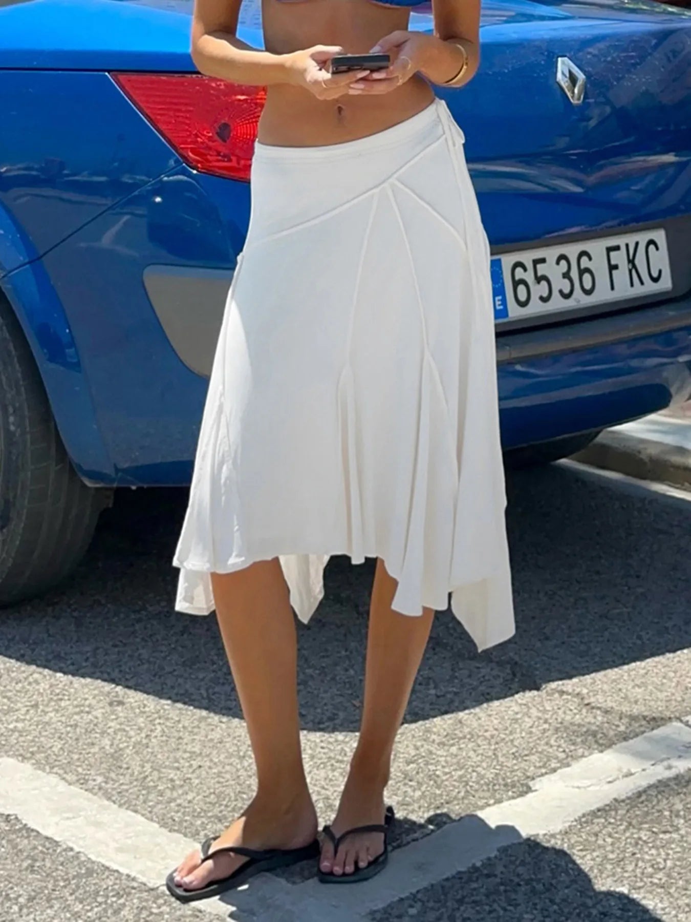 Vacation style temperament irregular European and American fashion spicy girl mid length skirt